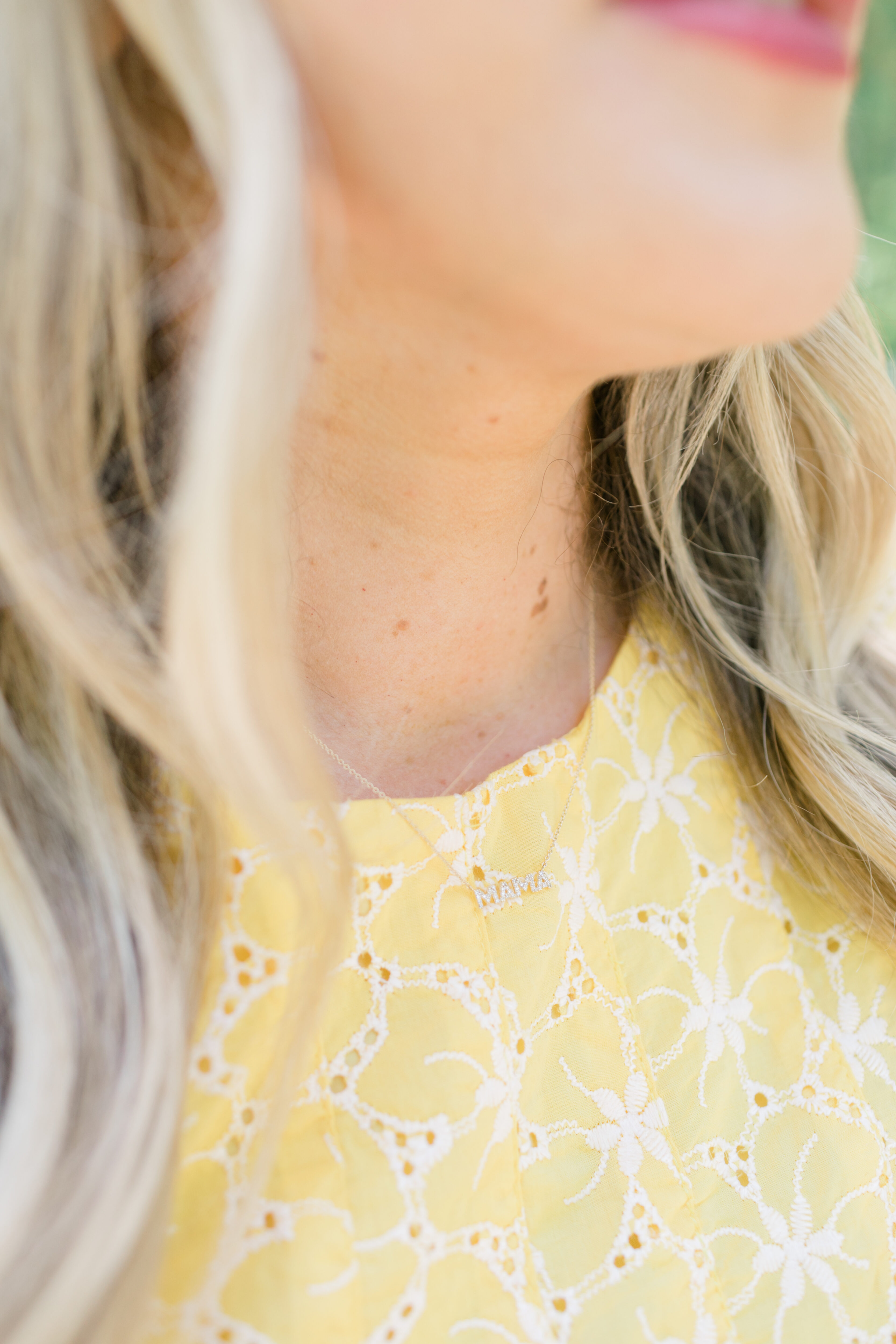 eyelet and lace detail on yellow dress