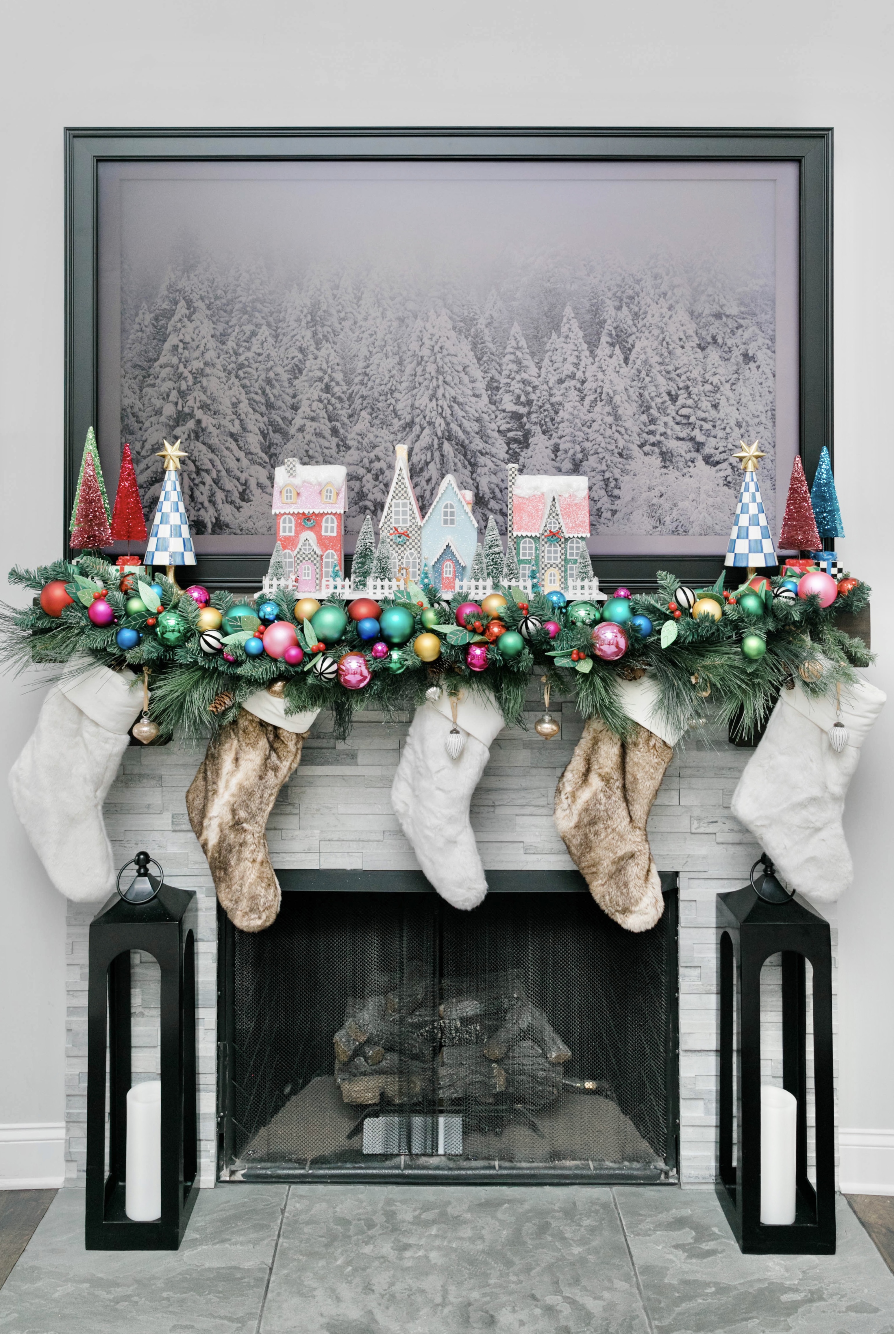 stockings with colorful ornament garland